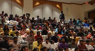 Image of students seated in a large event space.